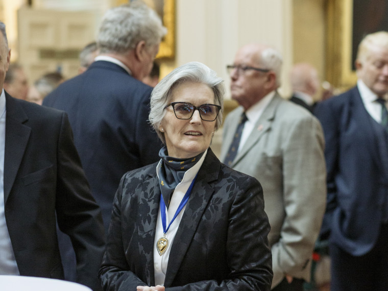 His Majesty Invests Dame Sue Bruce with the Insignia of a Commander of the Royal Victorian Order